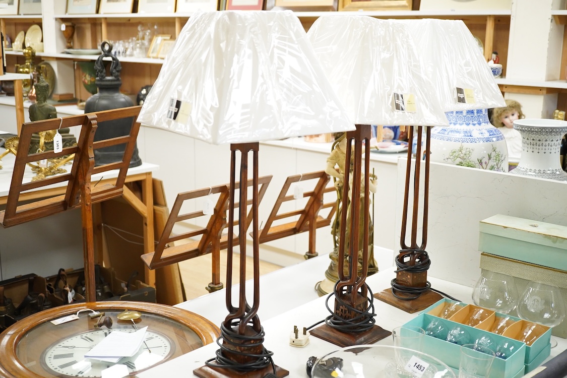 Three Indian hardwood table lamps with shades, 52cm high
